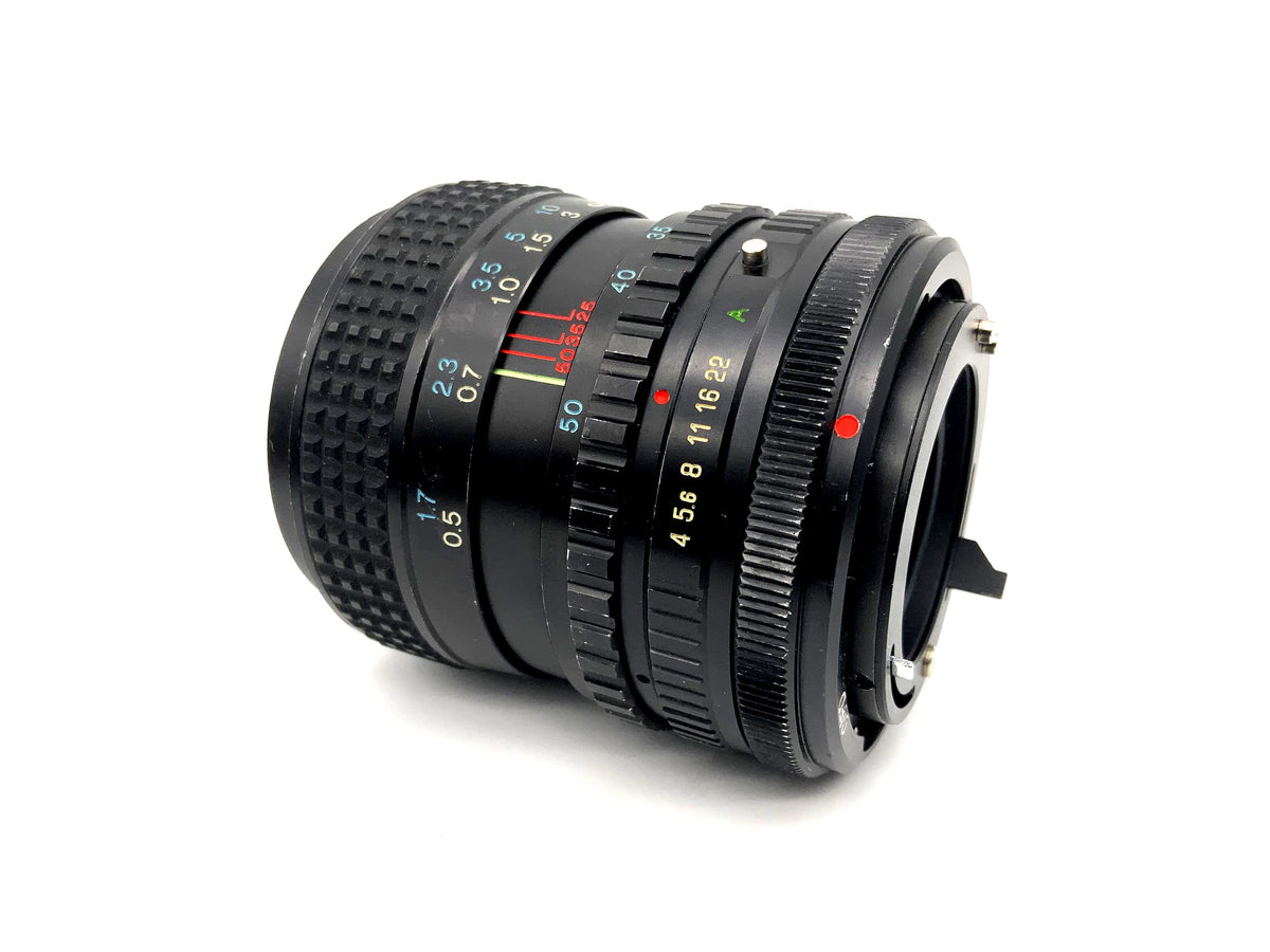 Tokina 25-50mm 1:4 Objektiv RMC Kamera Lens (Canon FD) Nebel!