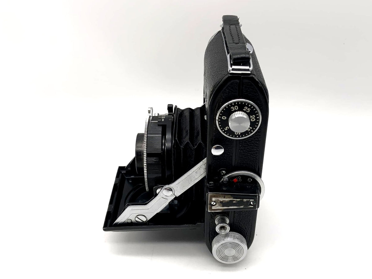 Balda Beltica folding camera with Carl Zeiss Tessar 1:3.5 f=5cm red T Cludor