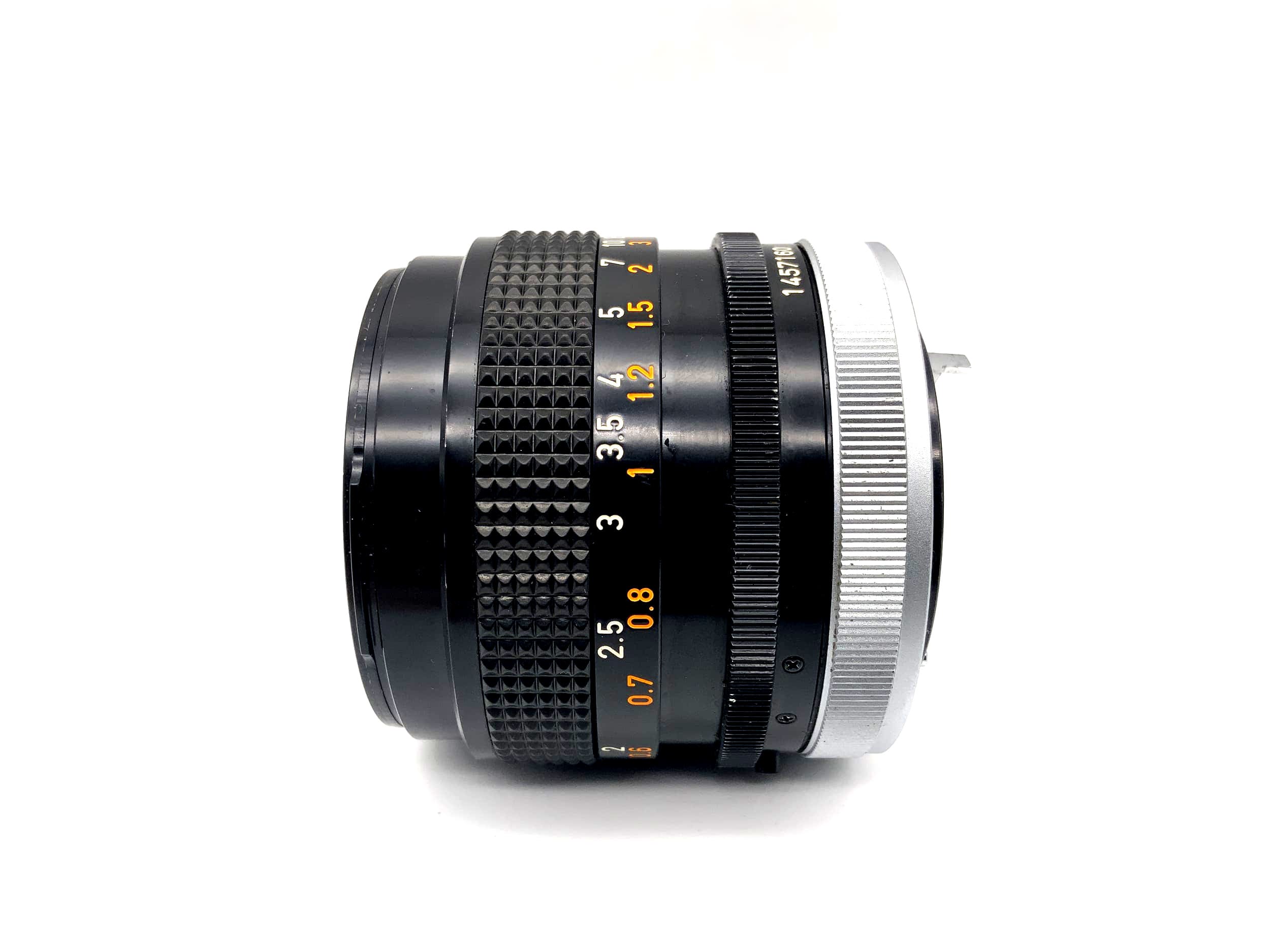 Canon 50mm 1:1.4 Objektiv Lens FD S.S.C. Camera Lens (Canon FD) Text lesen