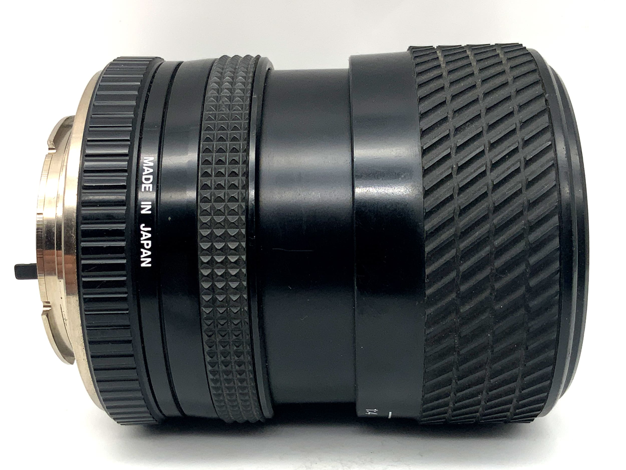 Tokina 28-70mm 1:3.9-4.8 Objektiv Zoomobjektiv (Minolta MD)