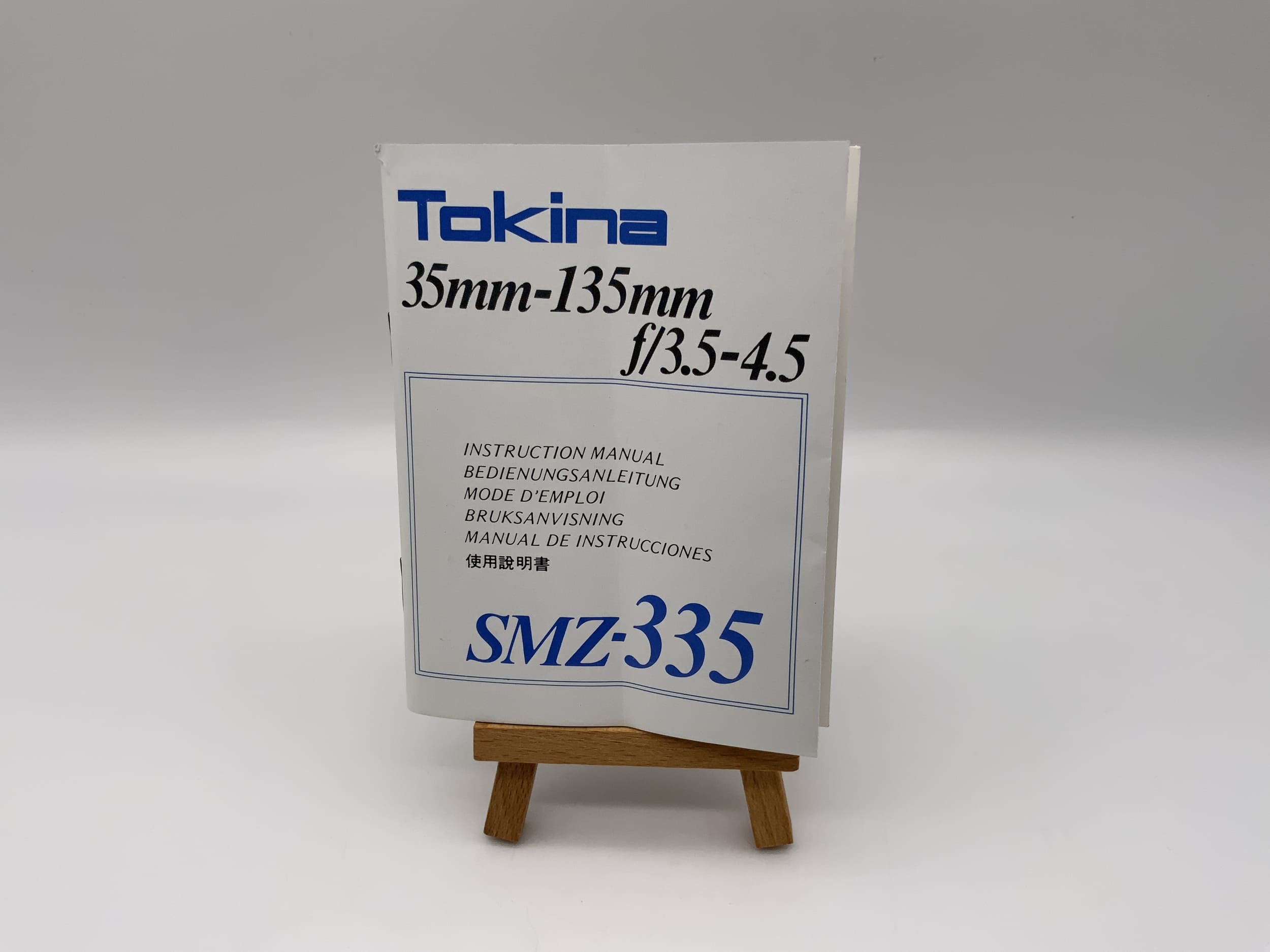 Tokina SMZ-335 35-135mm f/3.5-4.5 User Manual (German)