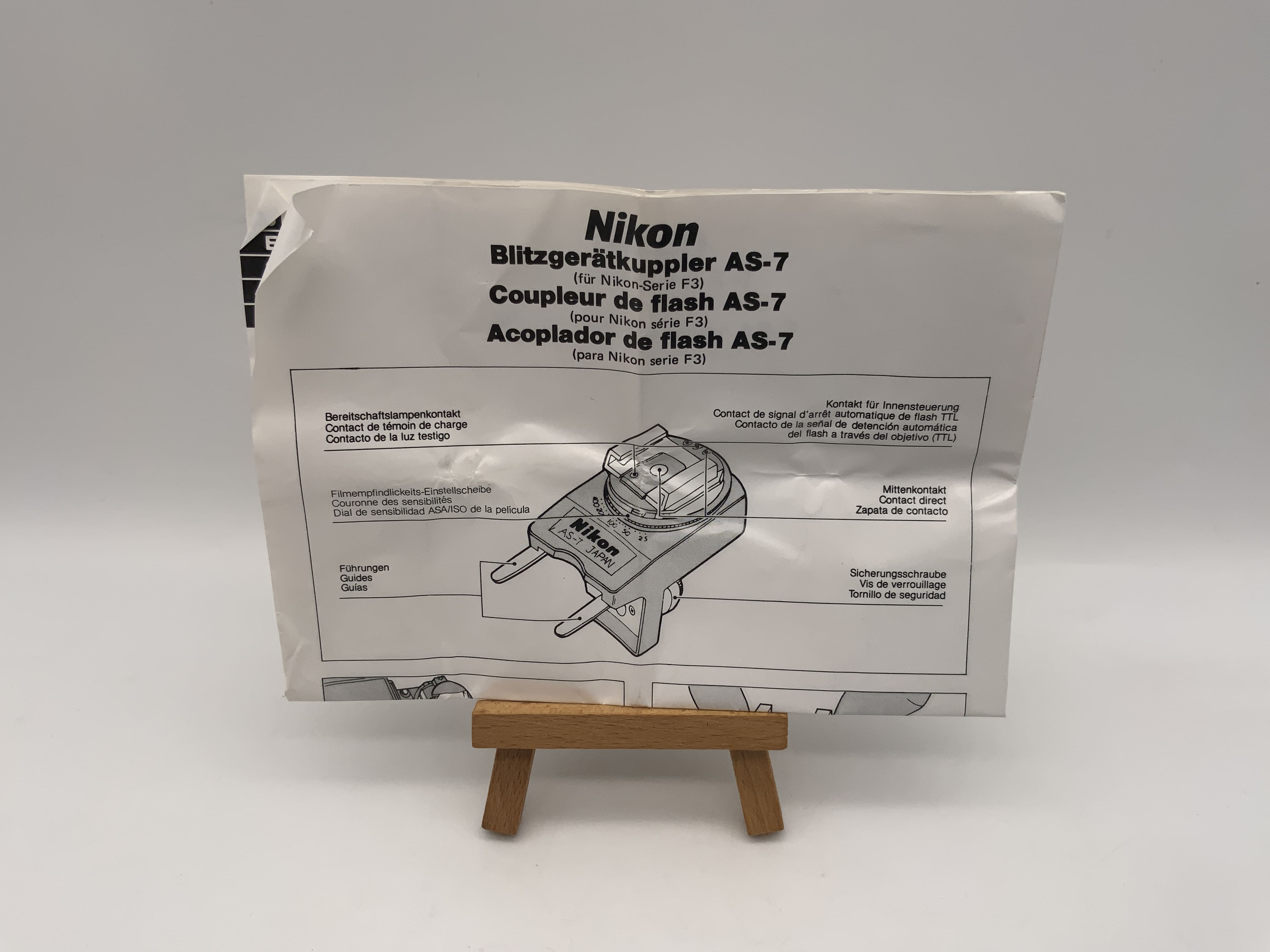 Nikon Blitzgerätkuppler AS-7 Gebrauchsanweisung Bedienungsanleitung Deutsch
