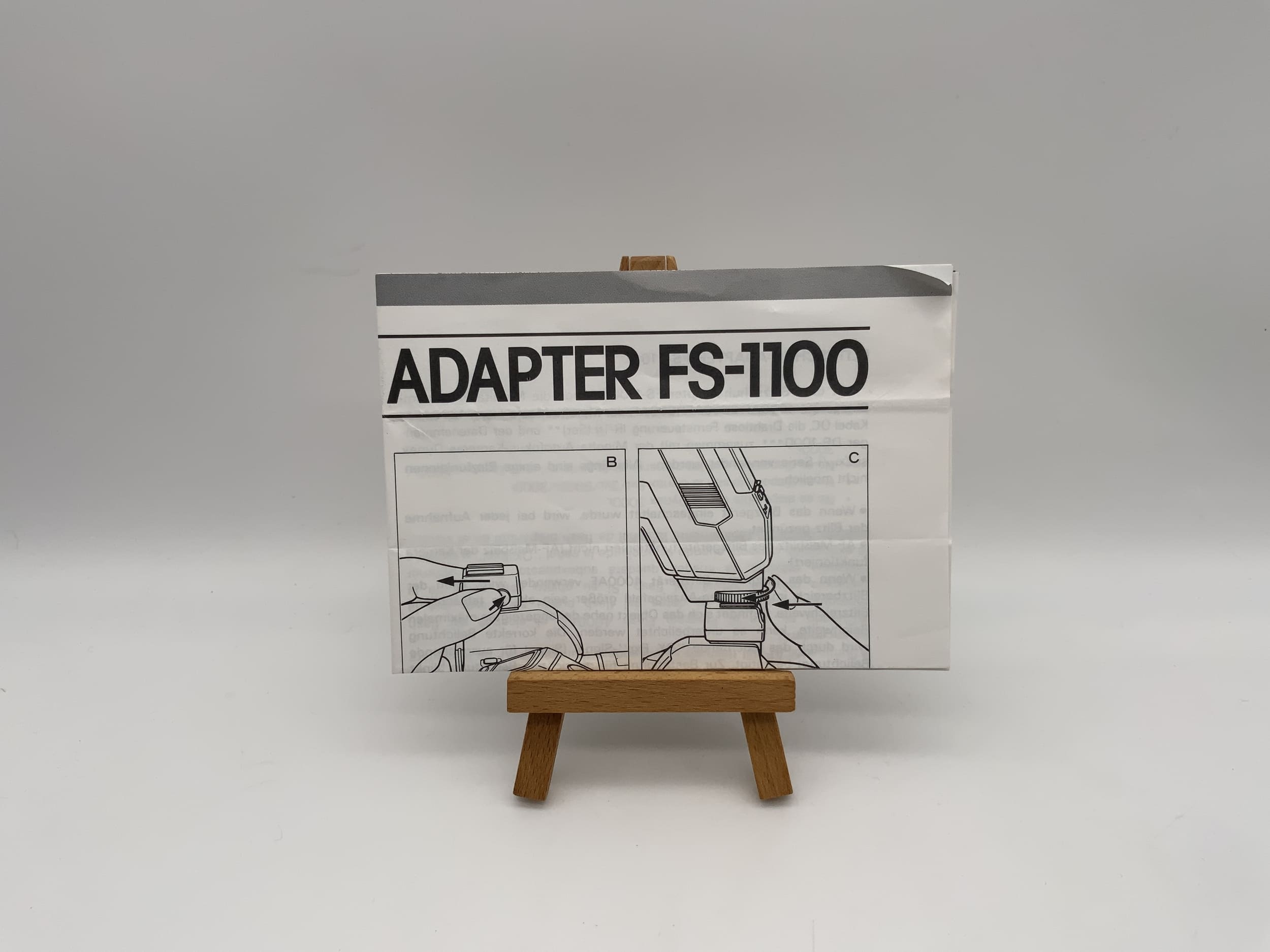 Minolta Flash Shoe Adapter FS-1100 Bedienungsanleitung Deutsch