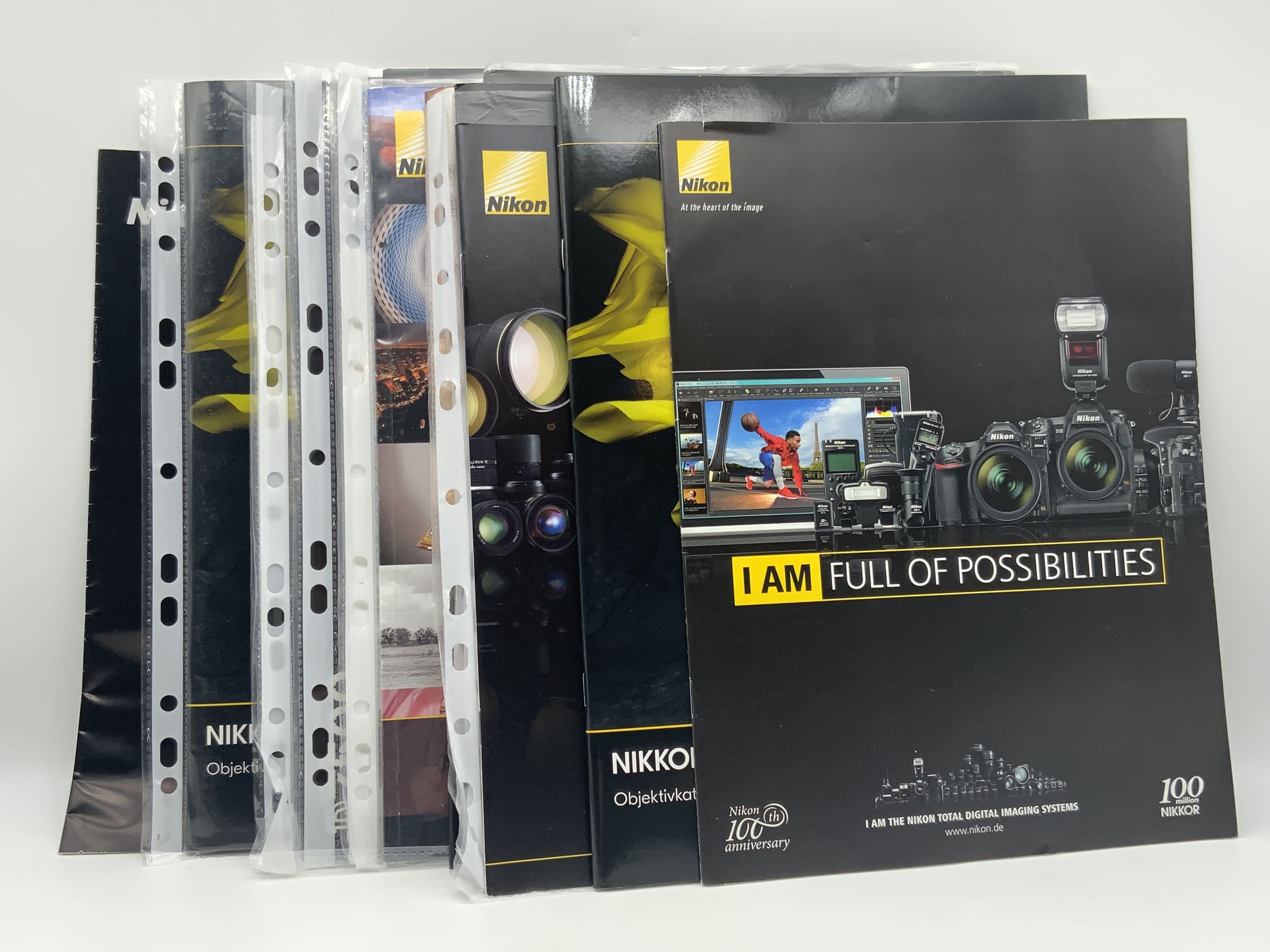 Nikon Konvolut / Sammlung an Nikon Heften und Broschüren über 10 Stück Deutsch