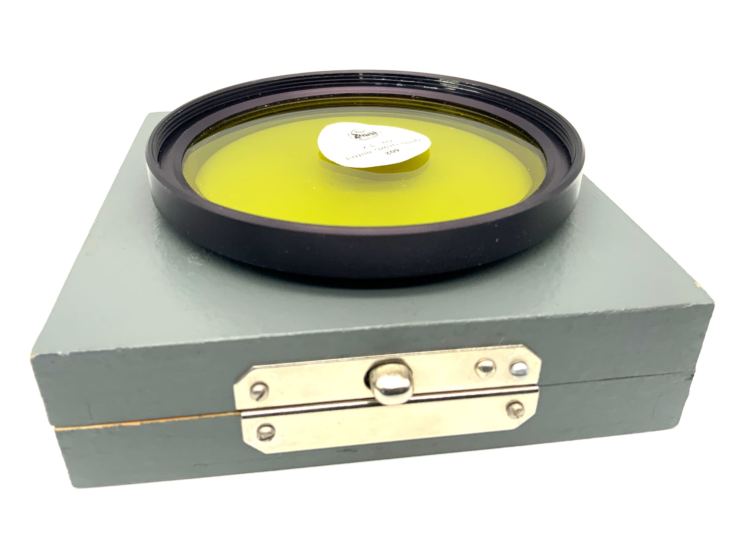 Filtre Pentacon jaune-vert moyen dans son emballage d'origine. Filtre Pentacon Six 77 mm