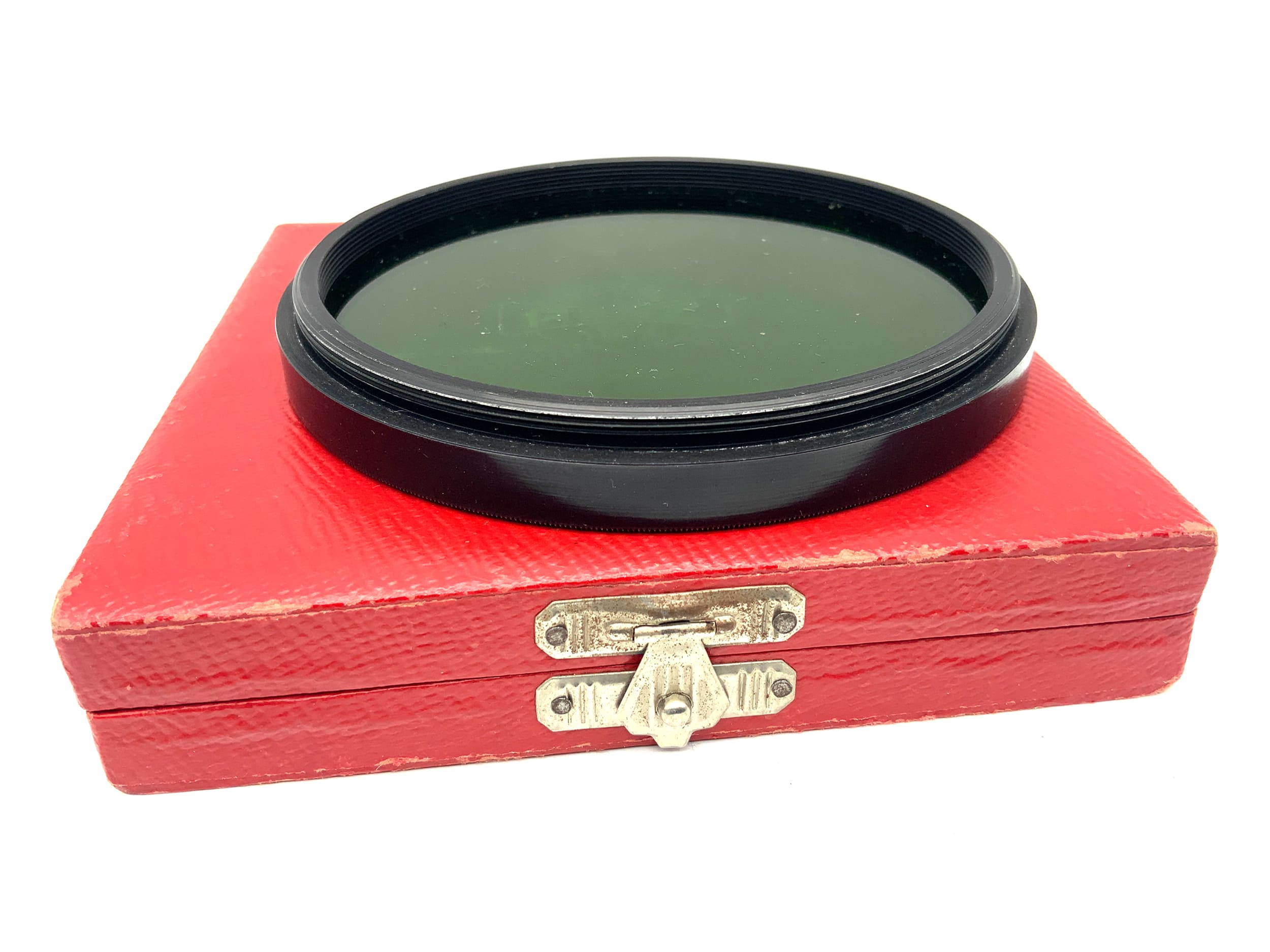 Filtre de couleur vert Arnz Jena dans son emballage d'origine. Filtre Pentacon Six 95 mm circulaire.