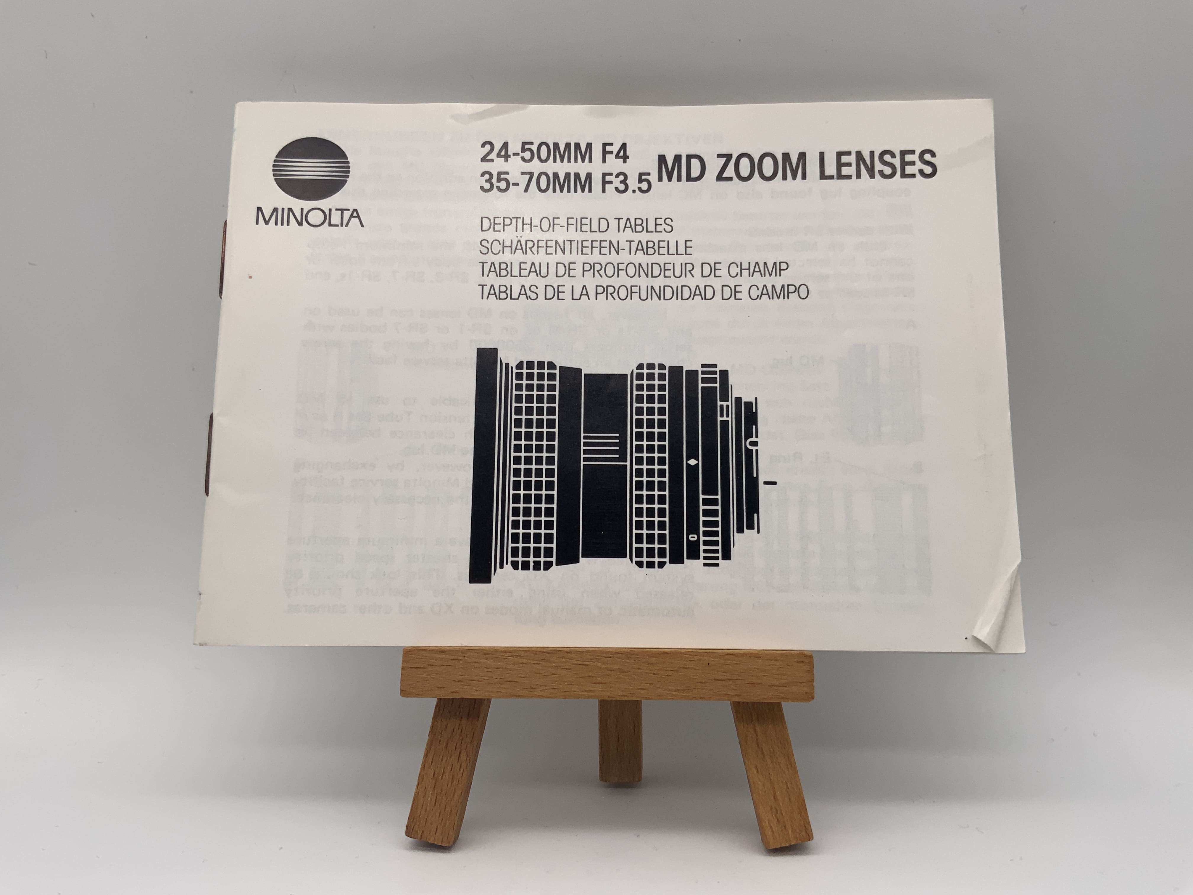 Minolta MD Zoom Lenses 24-50mm F4 / 35-70mm F3.5 Bedienungsanleitung Deutsch