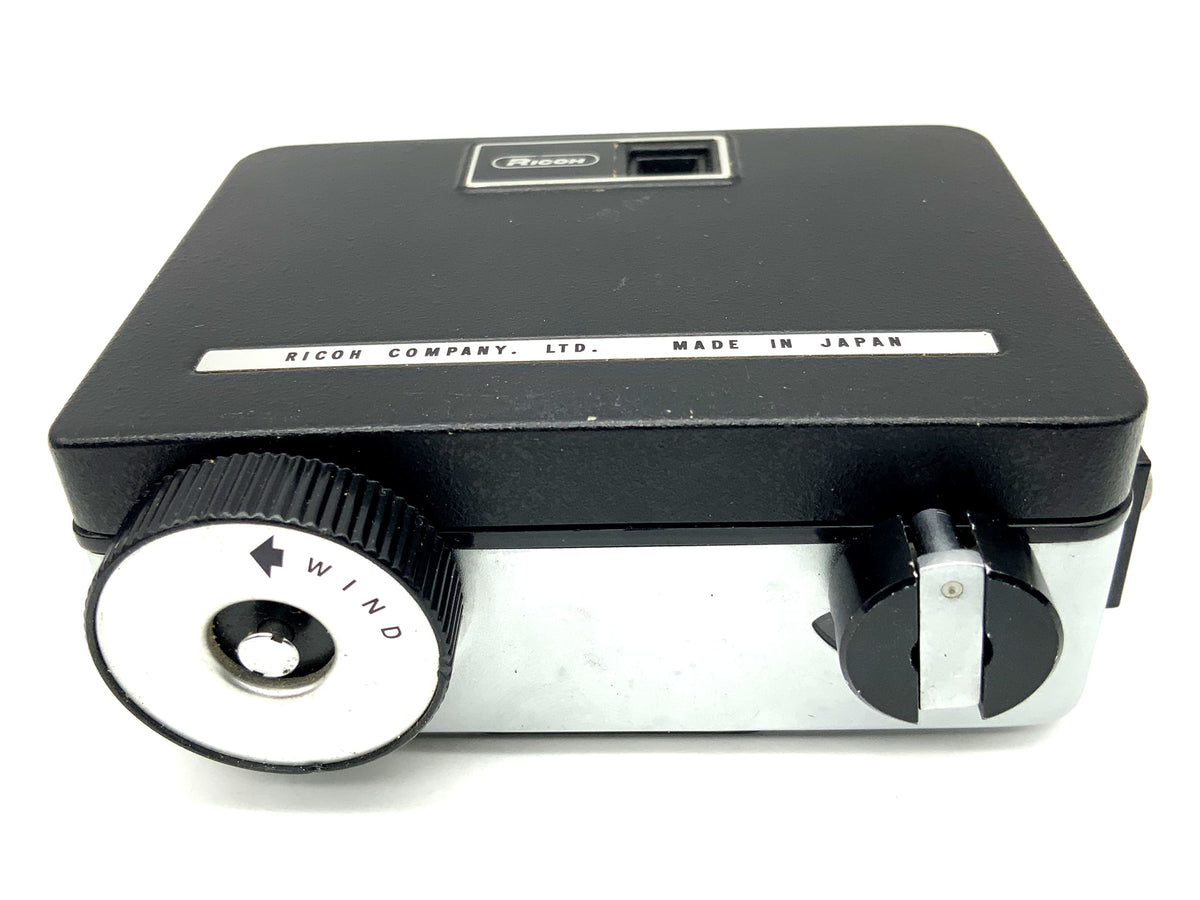 Appareil photo Ricoh Auto Half E avec viseur et objectif Ricoh 25 mm F:2.8 demi-format