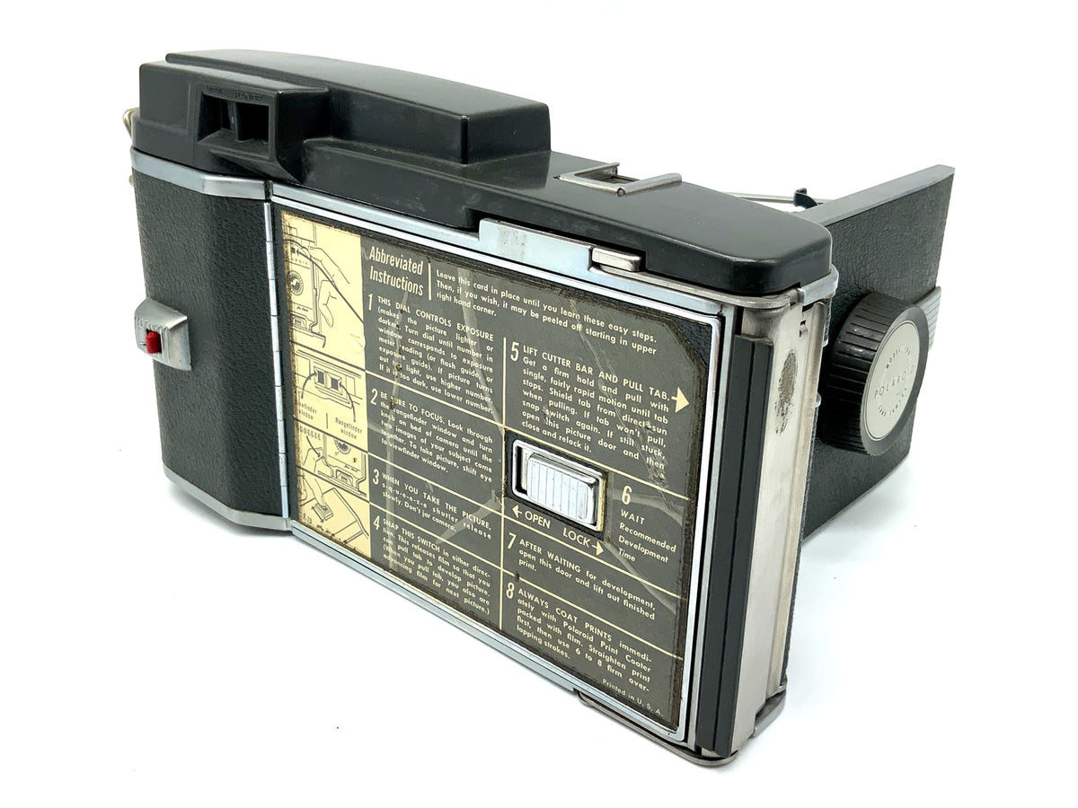 Appareil photo instantané Polaroid Land Camera modèle 160, rayures sur l'objectif