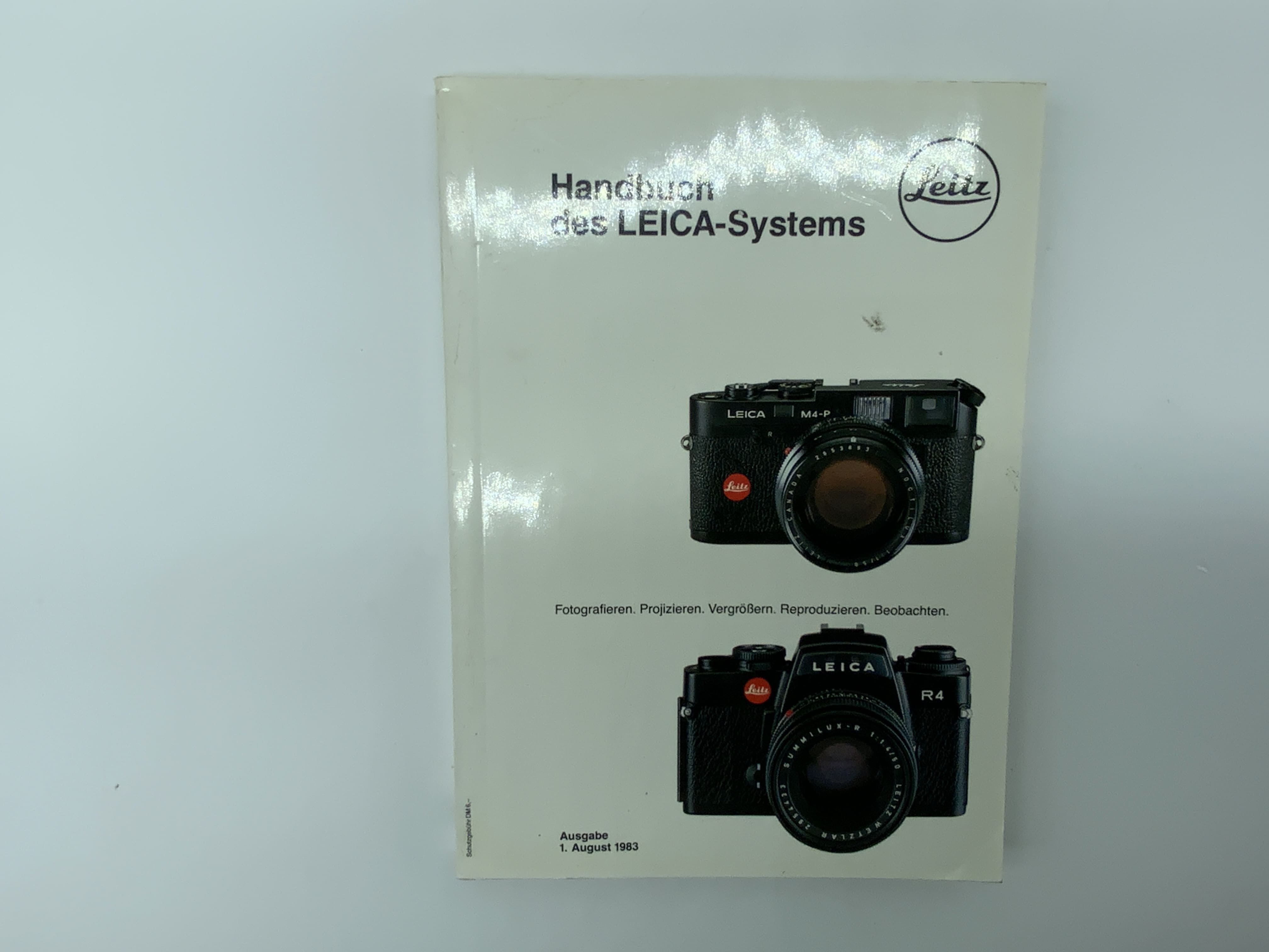 Leitz Handbook of the Leica System August 1983 Catalog German