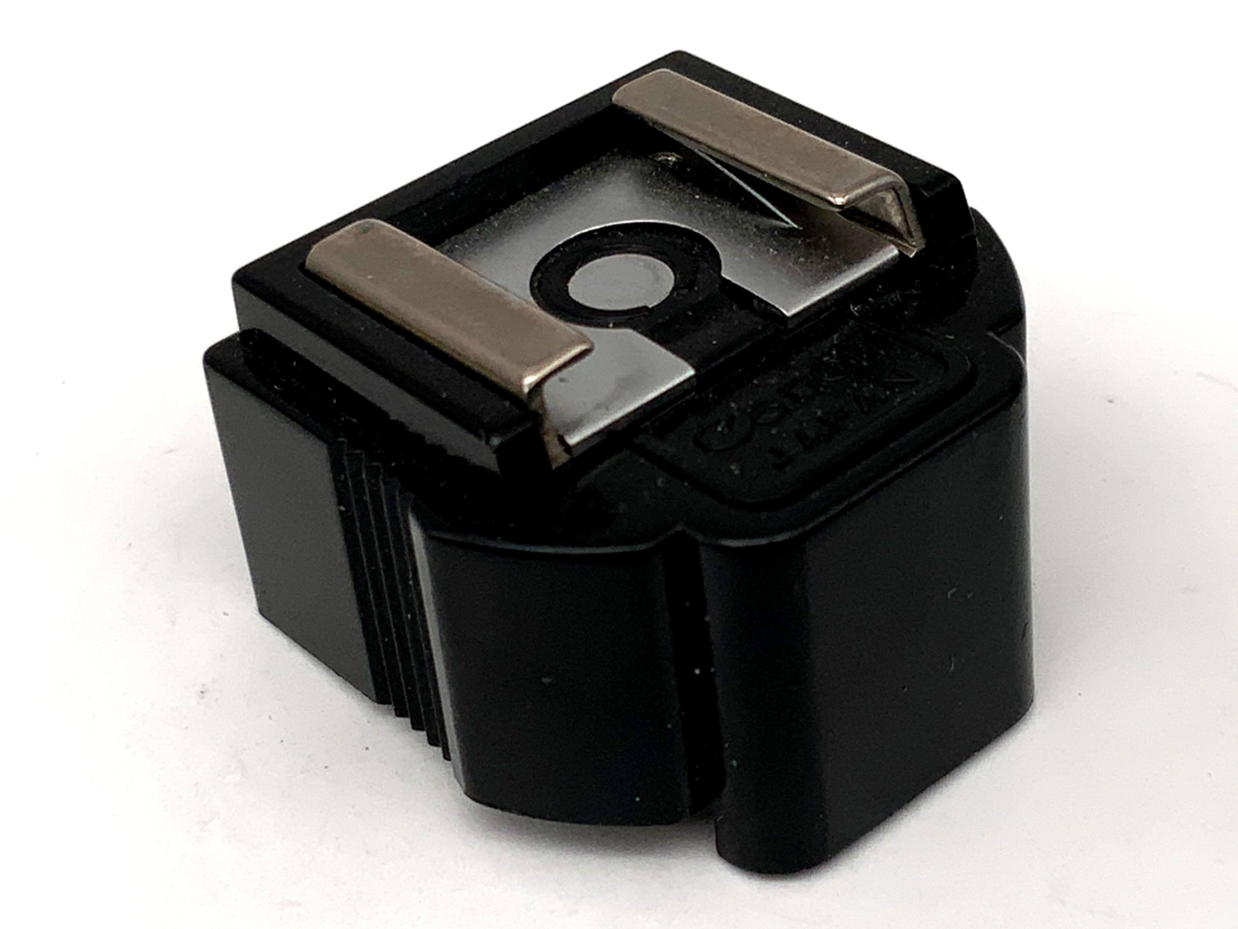 Adaptateur de flash pour griffe Canon F-1