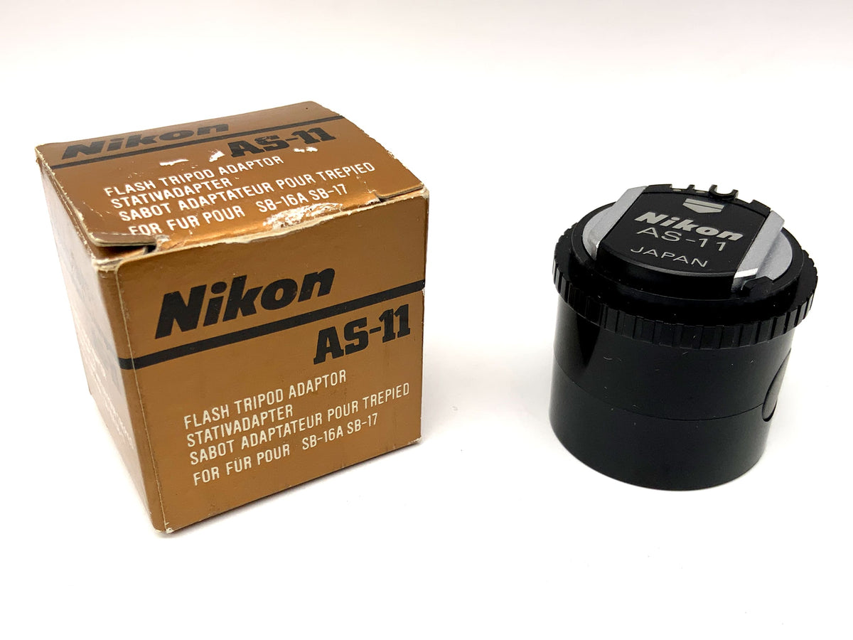 Adaptateur pour trépied avec griffe porte-flash Nikon AS-11 compatible avec les flashs SB-12, SB-16A, SB-17 et SB-21A.