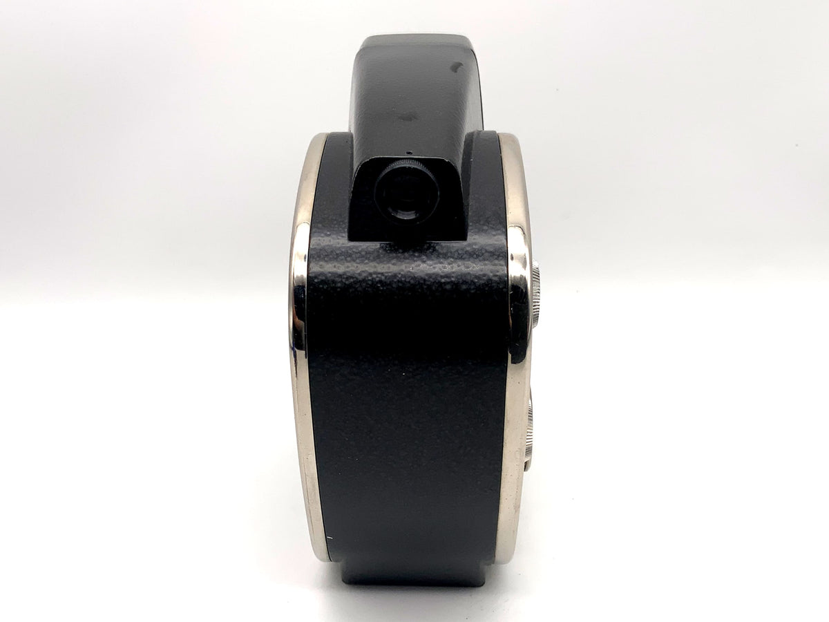 Appareil photo argentique Zenit Quarz M avec objectif 1,9/12,5 mm et poignée pour double film 8 mm.